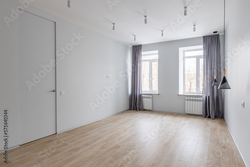 Empty gray room ready for people to move in