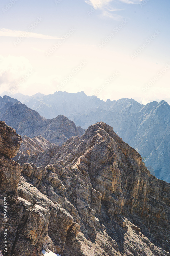 A wonderful mountain landscape with mountain peaks and a direct view of the Alps and the Zugspitze. Wonderful for hiking, mountain sports and wanderlust 