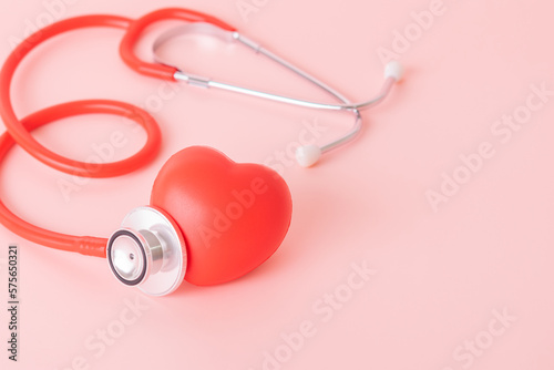 Red heart with doctor physician's stethoscope, World heart health day, doctor day.