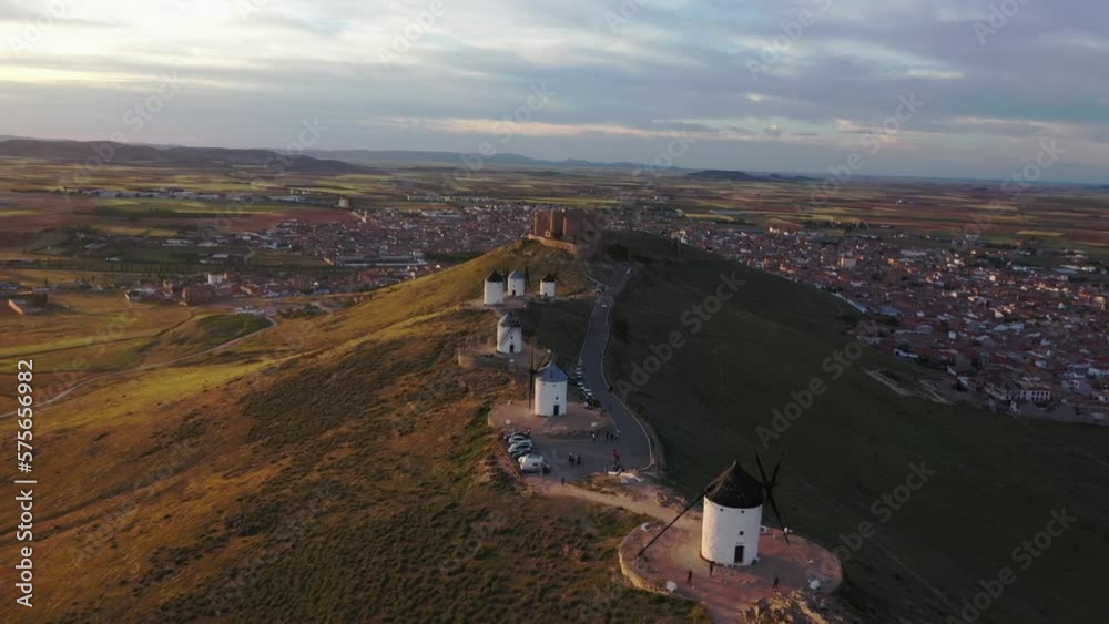 The iconic windmills at Consuegra, Spain, after sunset,