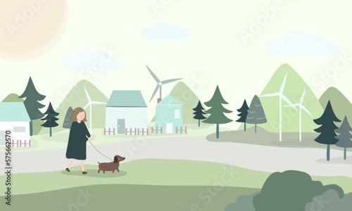 Young woman walking with dog in the village