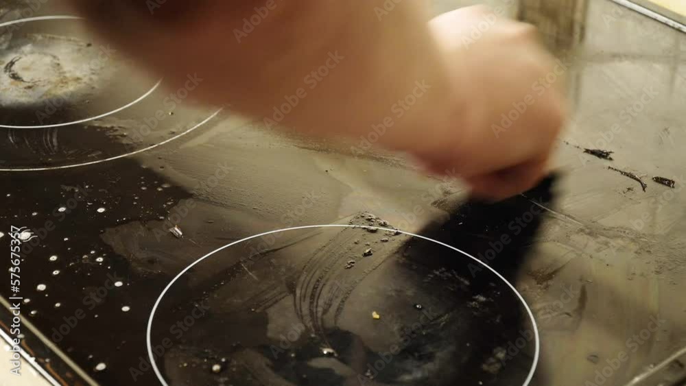 Cleaning the electric stove from carbon