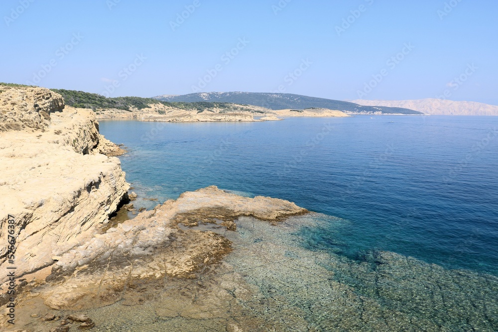 white rocks and blue sea in Lopar, island Rab, Croatia