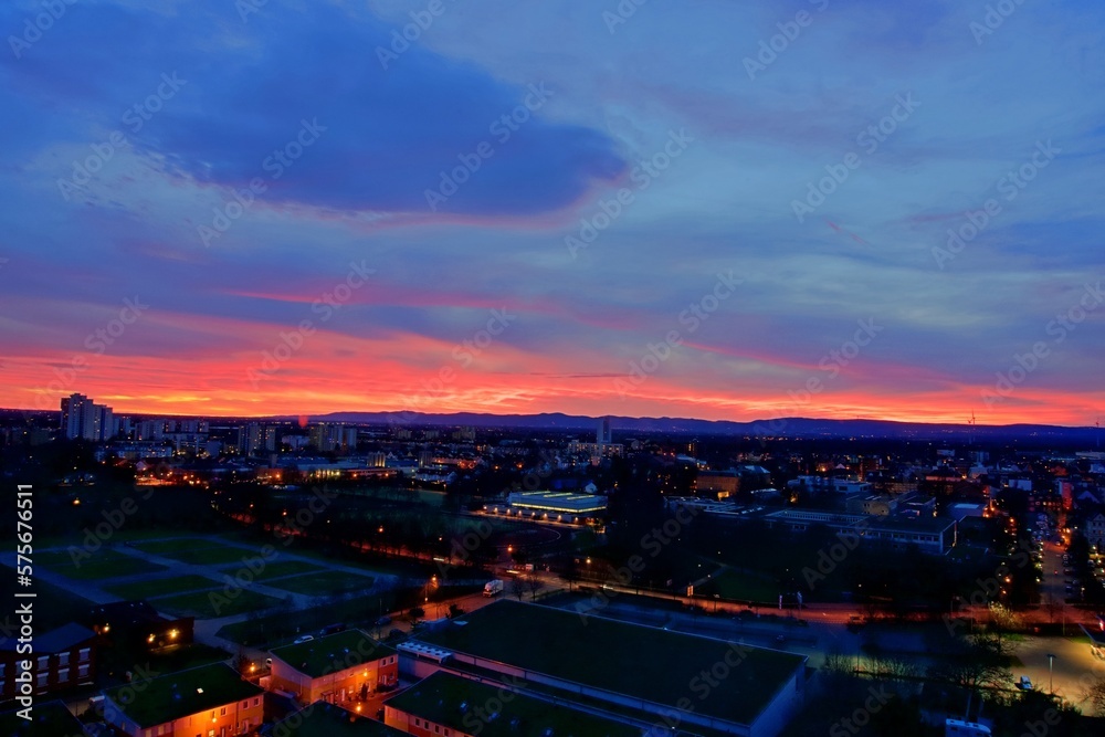 sunset over the city with red and blue colors