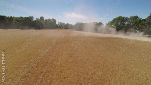 Coombe Hill Buckinghamshire Countryside Combine At Work Field Fying Through Drone photo