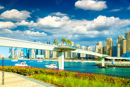 Canvas Print Dubai is a stunning metropolis with high-rise buildings at sunrise and sophisticated luxury yachts in the United Arab Emirates