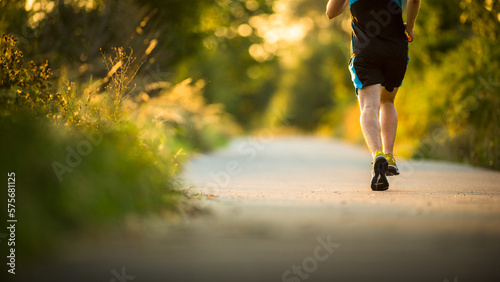 Shot of a young male athlete training. Getting his daily dose of mileage, to stay fit and lean.