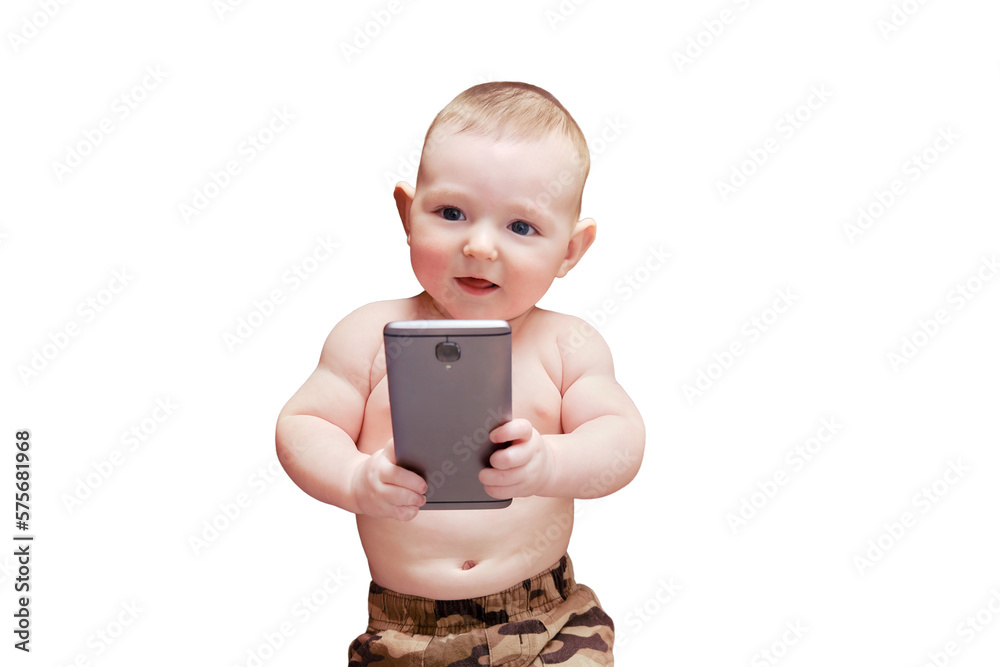 Funny happy baby boy with a phone in his hands. Smiling child holds a smartphone, isolated on a white background