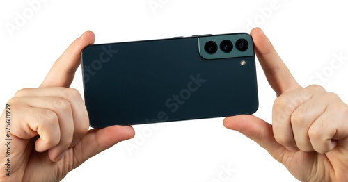 Green smartphone in hands back