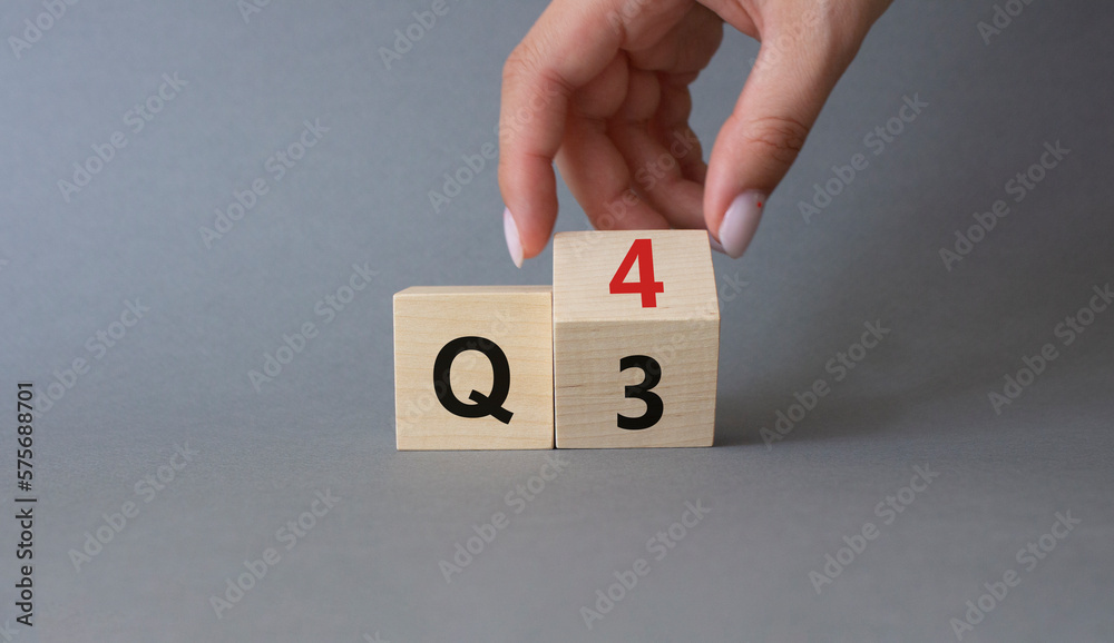 From 3rd Quarter to 4th symbol. Businessman hand Turnes cube and ...