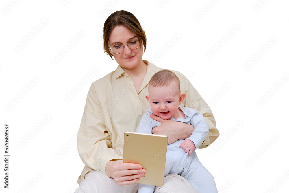 Happy woman mother with infant baby watching in digital tablet while sitting on home sofa in living room, isolated on a white background. Kid aged six months Happy woman mother with infant baby watching in digital tablet while sitting on home sofa in living room, isolated on a white background. Kid aged six months
