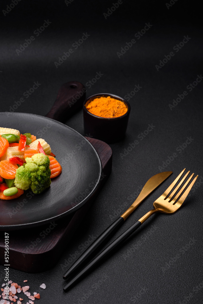 Delicious juicy broccoli vegetables, carrots, asparagus beans and bell peppers