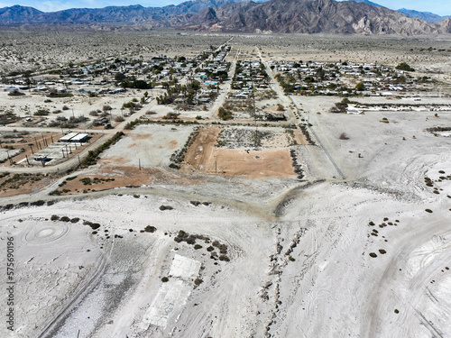 An Aerial UAV Drone View of the West Coast of the Salton Sea Near Thermal, California, Showing the Evaporated Salts from the Water and the abandoned Marina with the Infrastructure Seen in the Salt  photo