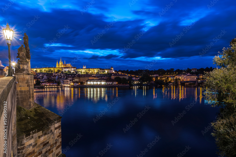 View of the Prague Castle from the Charles Bridge at night