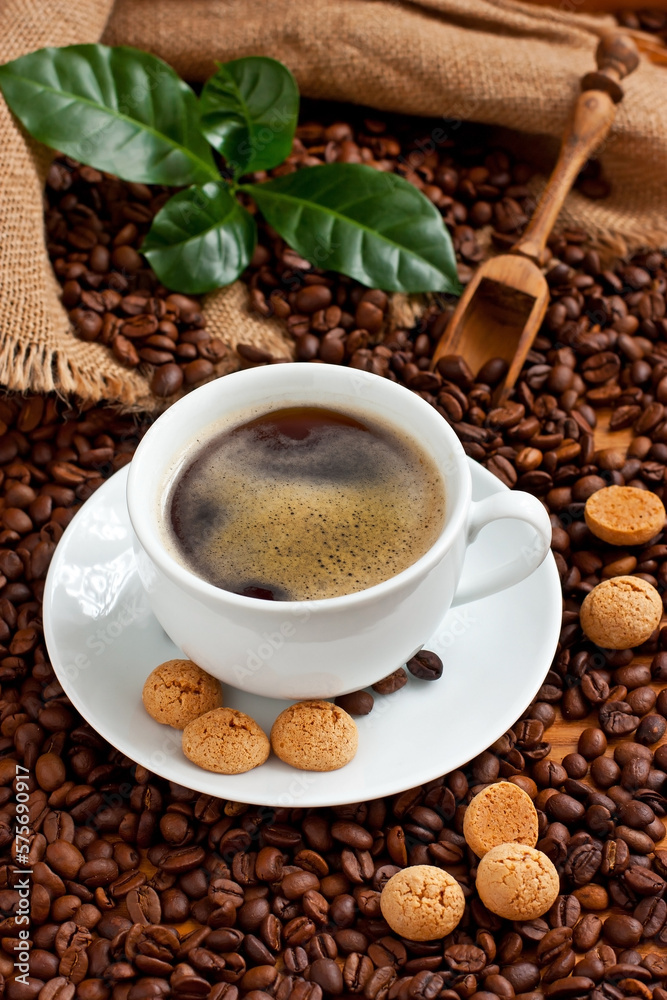 Fototapeta premium Cup of coffee with almond cookies