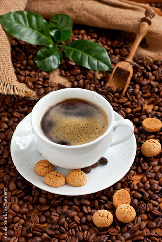 Cup of coffee with almond cookies