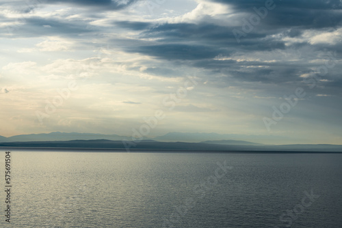 Adriatic sea and island of Krk on horizon seen from the town of Lovran in Croatia