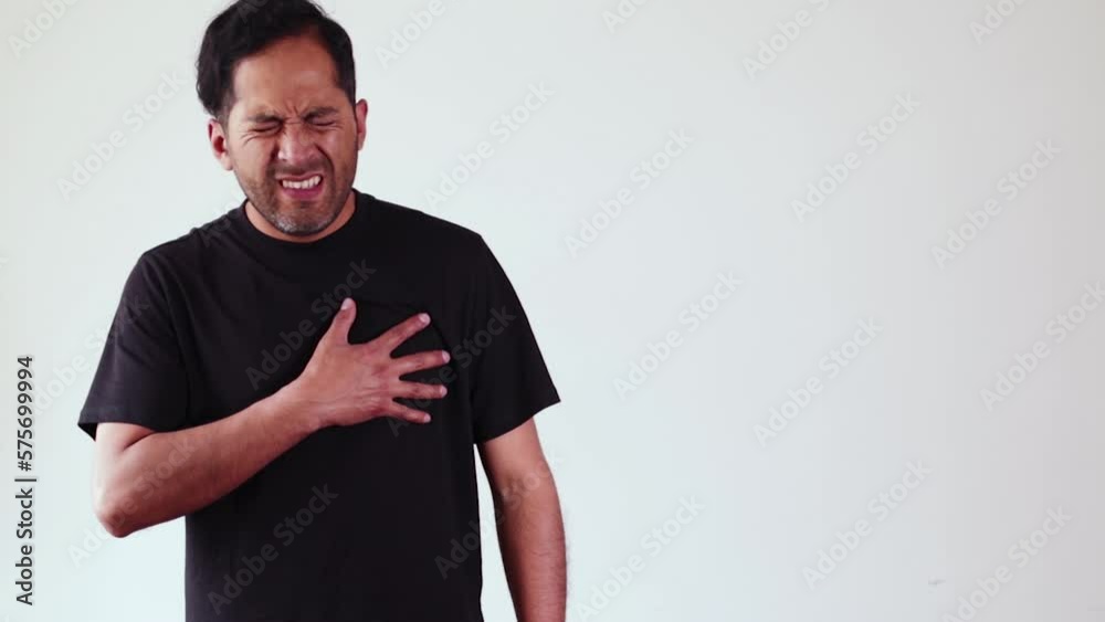 Video of person clutching his chest in pain. Concept of diseases, cardiac arrest, heart pain, health. Video of person clutching his chest in pain. Concept of diseases, cardiac arrest, heart pain, health.
