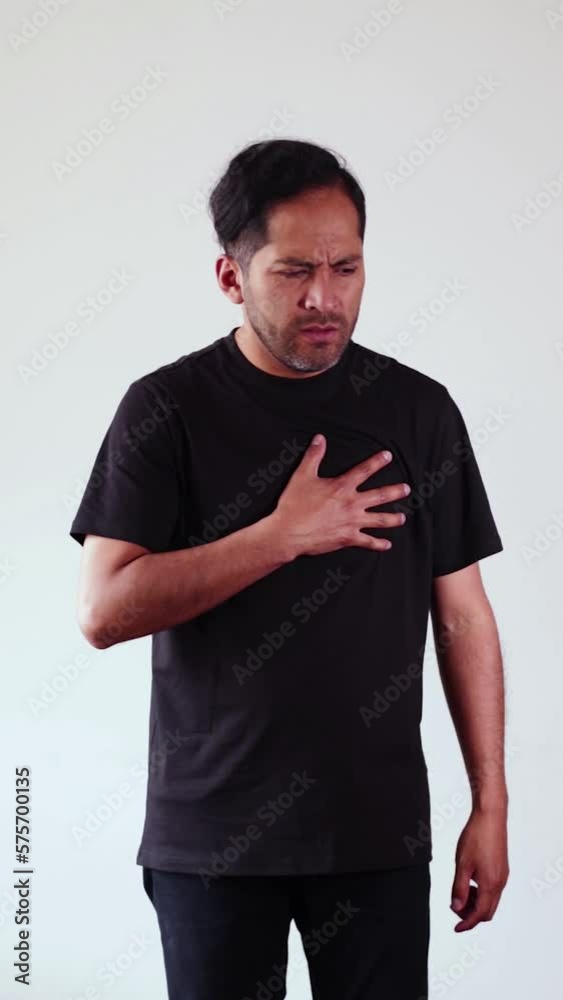 Video of person clutching his chest in pain. Concept of diseases, cardiac arrest, heart pain, health.