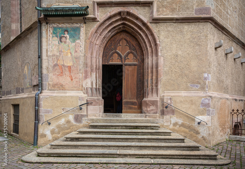The gothic portal of The St. Barbara Chapel.  Is a chapel located in the town of Merano in South Tyrol, northern Italy (15th century) © lorenza62