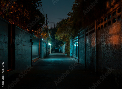 A dark alleyway with a wall