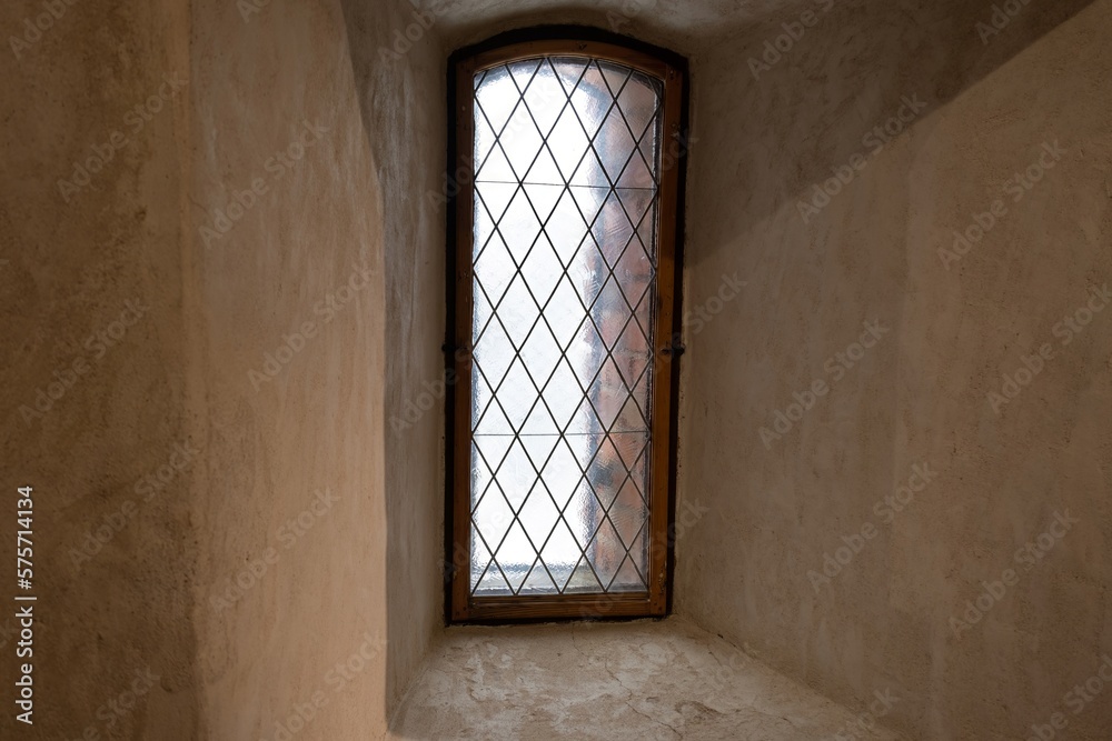 Old window from interior of a medieval castle