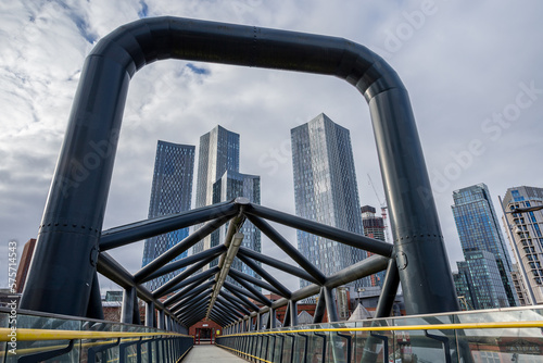 Fényképezés Deansgate Square seen through a footbridge