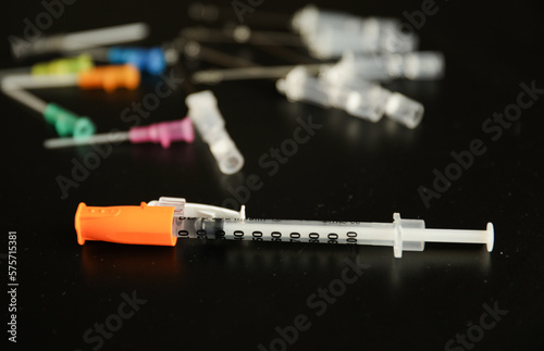 flu vaccine and needle syringes showing opioid crisis needle therapy and virus photo