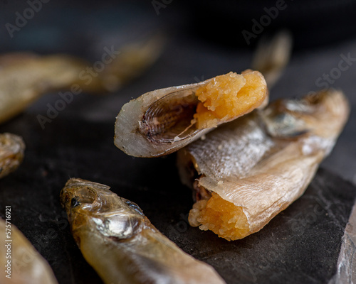 Salted dried capelin. Fish appetizer for beer