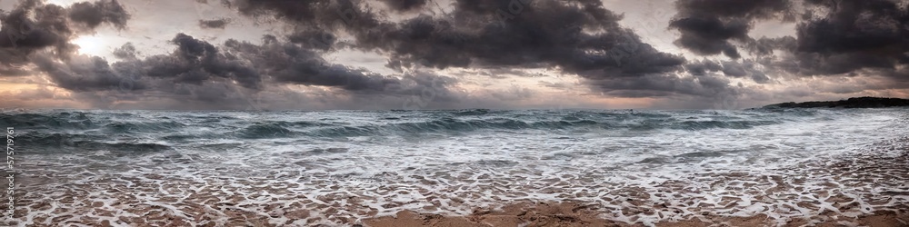 Sandy deserted beach with ocean waves on the shore. Skies and water meet on the horizon by generative AI Sandy deserted beach with ocean waves on the shore. Skies and water meet on the horizon by generative AI