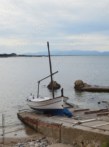 Boat docked at the ramp near the beach