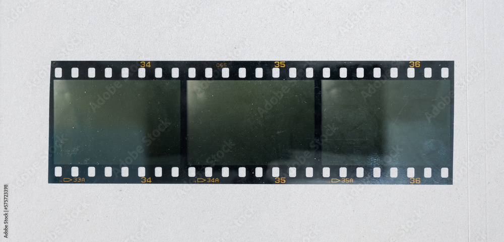 blank filmstrip with three empty cells isolated on white paper background, vintage retro photo placeholder mock up.