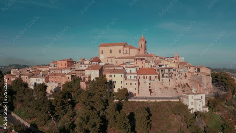 aerial view from the drone of the medieval village of Monteprandone in the province of Ascoli Piceno in the Marche region. The village overlooks the hills below and enjoys a beautiful sea view aerial view from the drone of the medieval village of Monteprandone in the province of Ascoli Piceno in the Marche region. The village overlooks the hills below and enjoys a beautiful sea view