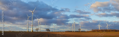 A large wind farm in northern Germany in the evening light,