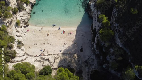 Cala Macarelleta ubicada en el sur de Menorca, Islas Baleare, es probablemente una de las playas mas bonitas de España, que destaca por su agua transparente de color turquesa. photo