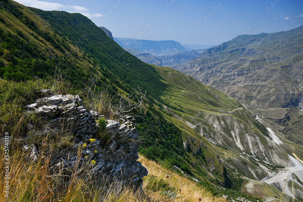 Beautiful panoramic view of the mountains with forests on a sunny summer day. Dagestan