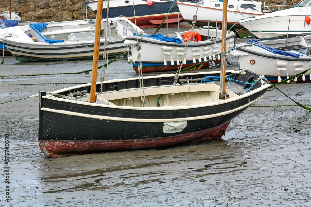 Boats in the mud at Padstow Harbour, Cornwall at low tide