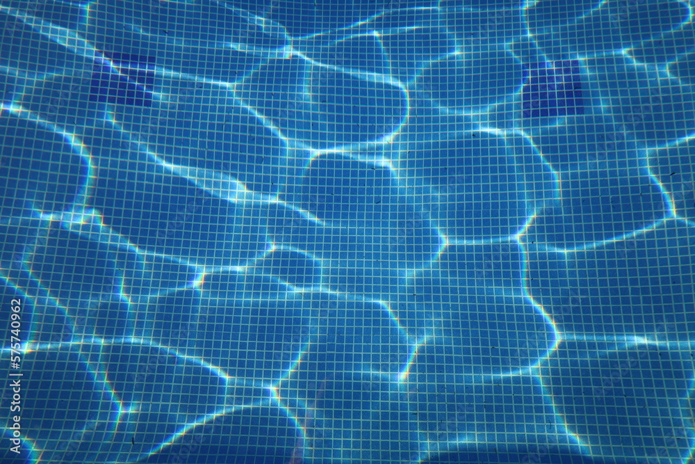 Pool background and sun reflexes, blue and turquoise little tiles Pool background and sun reflexes, blue and turquoise little tiles