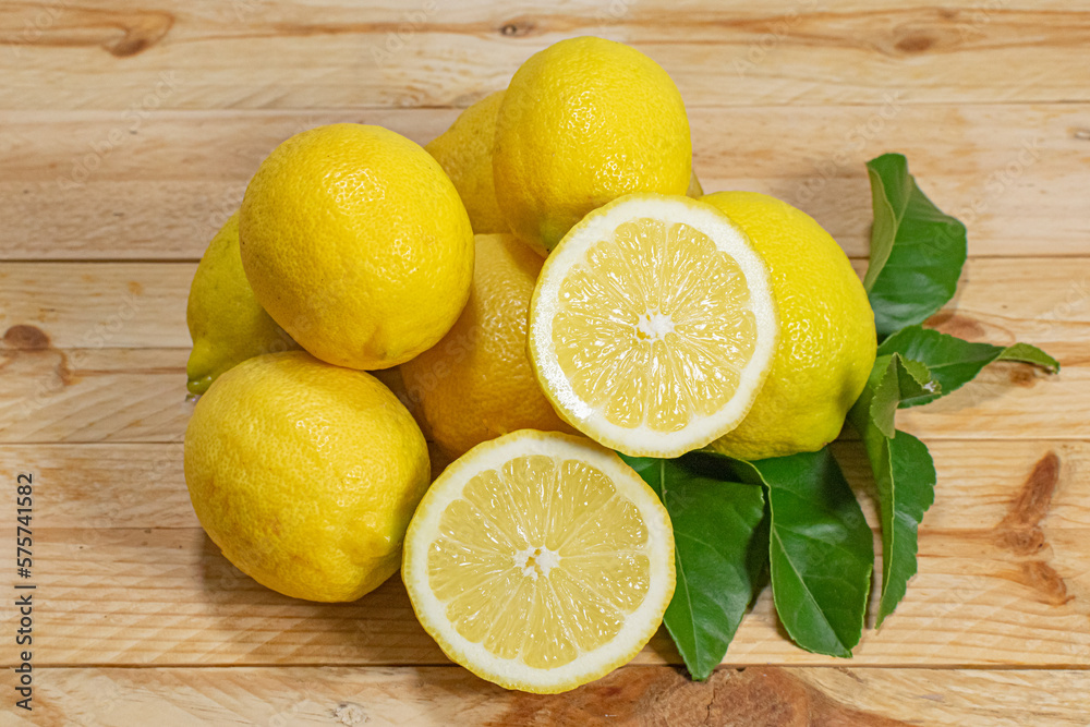 Fresh and healthy lemons on a wooden table Fresh and healthy lemons on a wooden table