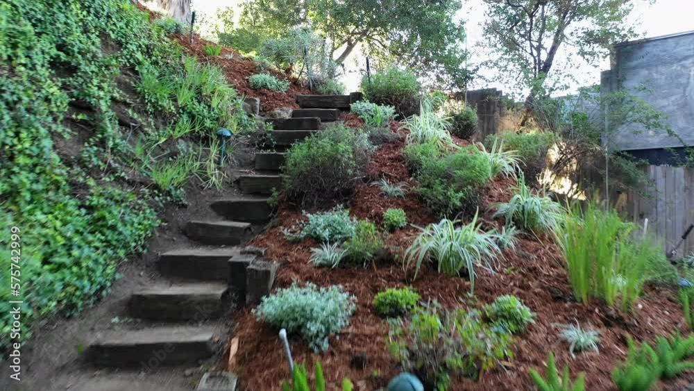 Aerial: Drone Forward Shot Of Steps In Tranquil Garden At Back Yard -  Los Angeles, California