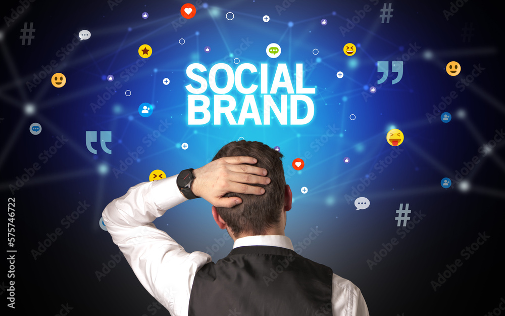 Rear view of a businessman, social media concept Rear view of a businessman, social media concept