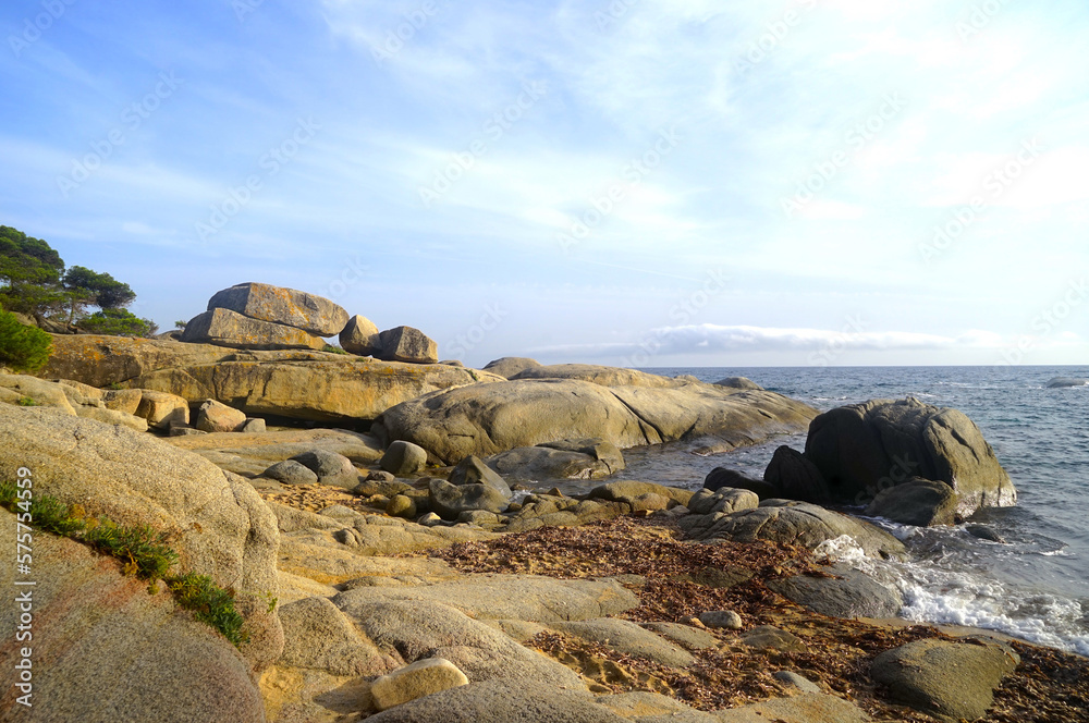beach, coast with very large stones washed by the sea on the costa brava near Palamos, Costa Brava, Catalonia, Spain