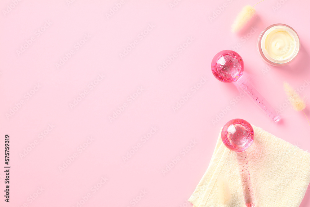 Face skin care cosmetic cream with ice globes for facials on pink background. Face skin care cosmetic cream with ice globes for facials on pink background.