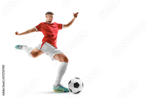 Professional soccer player hits the ball for the winning goal. Wide angle. Soccer. The concept of sport, competition, movement, overcoming © Ruslan Shevchenko