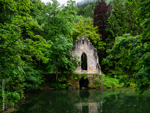 Ruins of old chapel, at the lake and surrounded by the forest. Chamonix, France