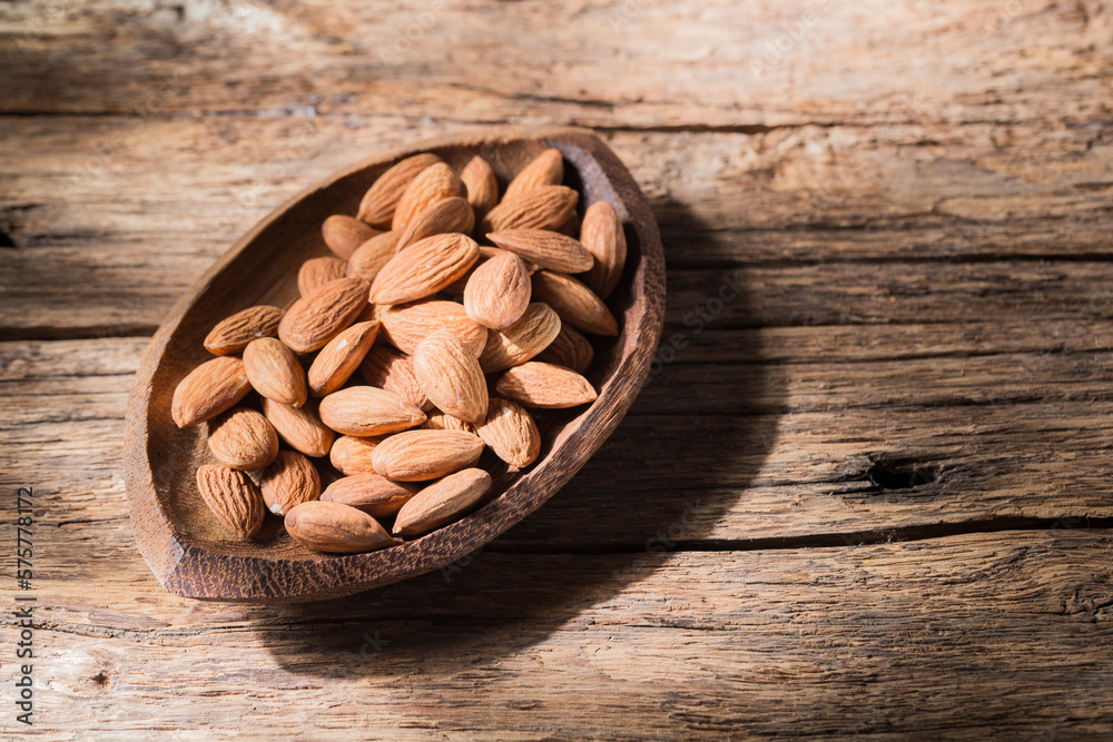 pile of natural almonds (Prunus dulcis) close-up image pile of natural almonds (Prunus dulcis) close-up image