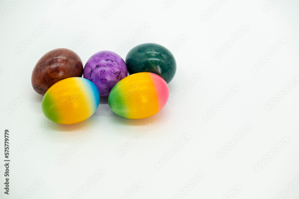 Easter multicolored eggs on a light background.Easter food.Spring religious holiday.Easter holiday tradition. Easter multicolored eggs on a light background.Easter food.Spring religious holiday.Easter holiday tradition.