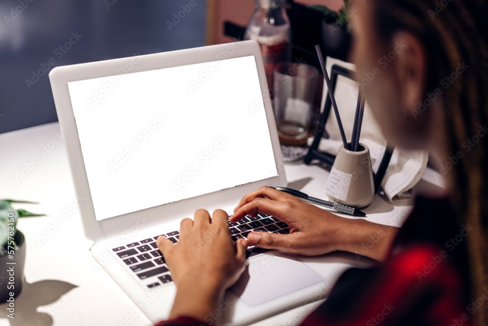 Young african american black woman relaxing and using laptop computer ...