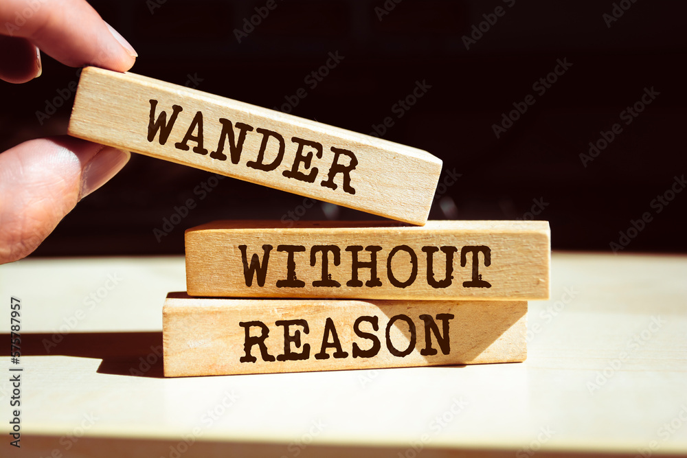 Wooden blocks with words 'Wander Without Reason'. Wooden blocks with words 'Wander Without Reason'.