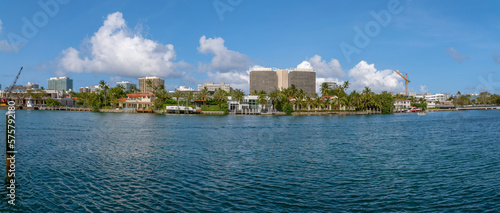 Scenic view of Biscayne Bay in Mami Beach Florida with apartments and homes. Panoramic view of a lagoon in the Intracoastal Waterway lined with waterfront residential buildings.